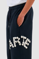 Pantalon à fleurs en crochet