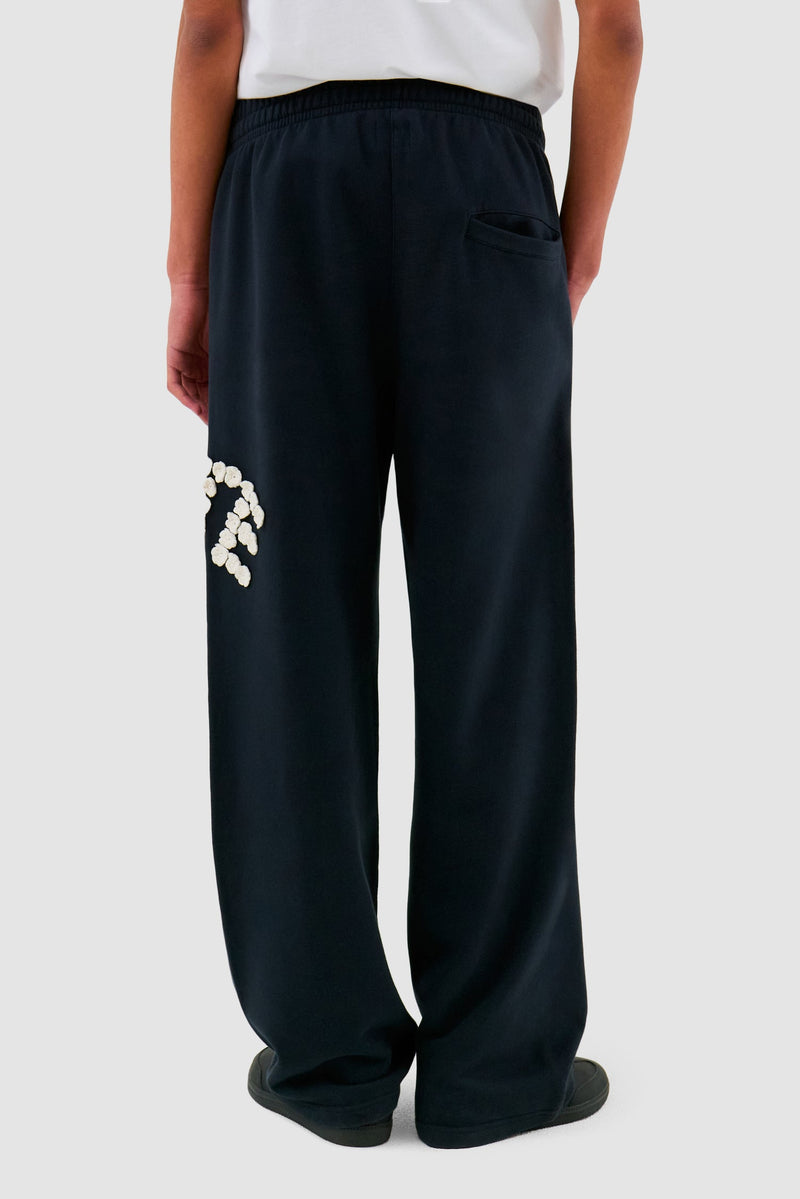Pantalon à fleurs en crochet