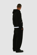 Sweat à capuche zippé avec logo fleuri