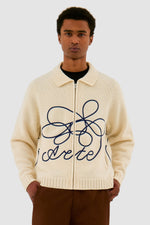 Pull en maille avec logo en fleuri