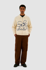 Pull en maille avec logo en fleuri