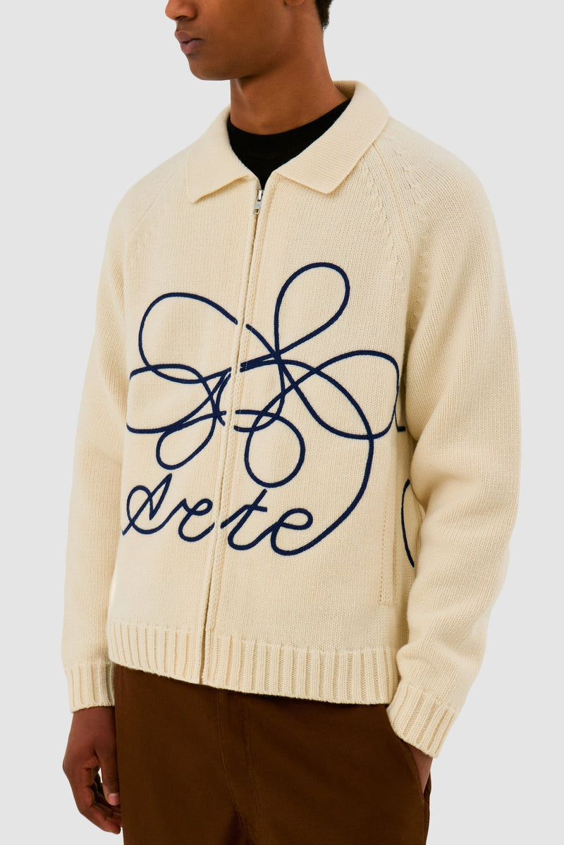 Pull en maille avec logo en fleuri